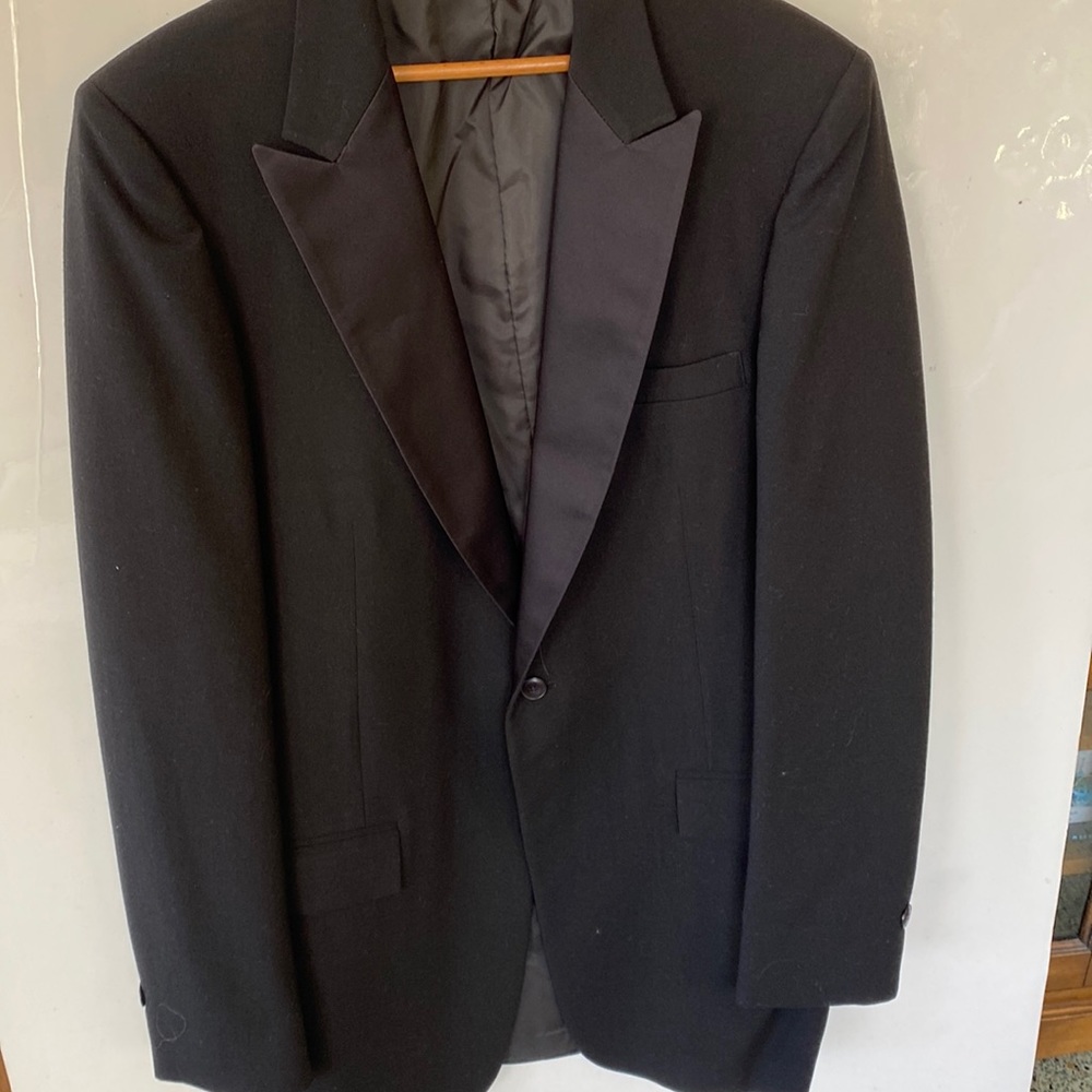 Men like new black TUXADO JACKET with black satin lapels, three front pockets
